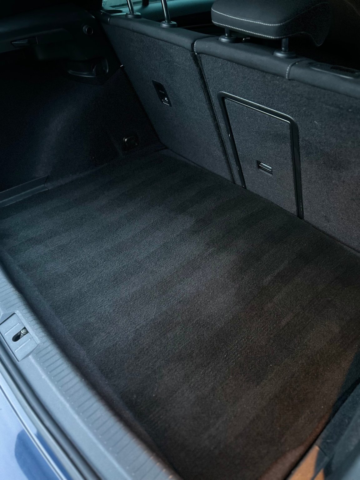 Fresh vacuum lines in the clean Volkswagen boot carpet
